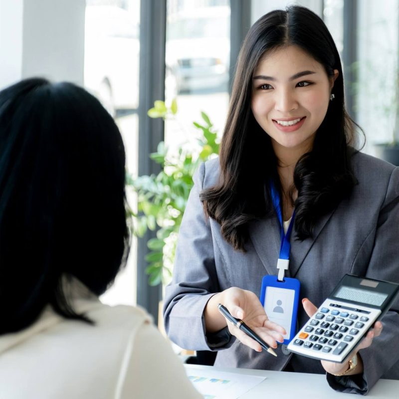 salesperson-presents-a-product-service-travel-savings-finance-investment-or-life-insurance.jpg